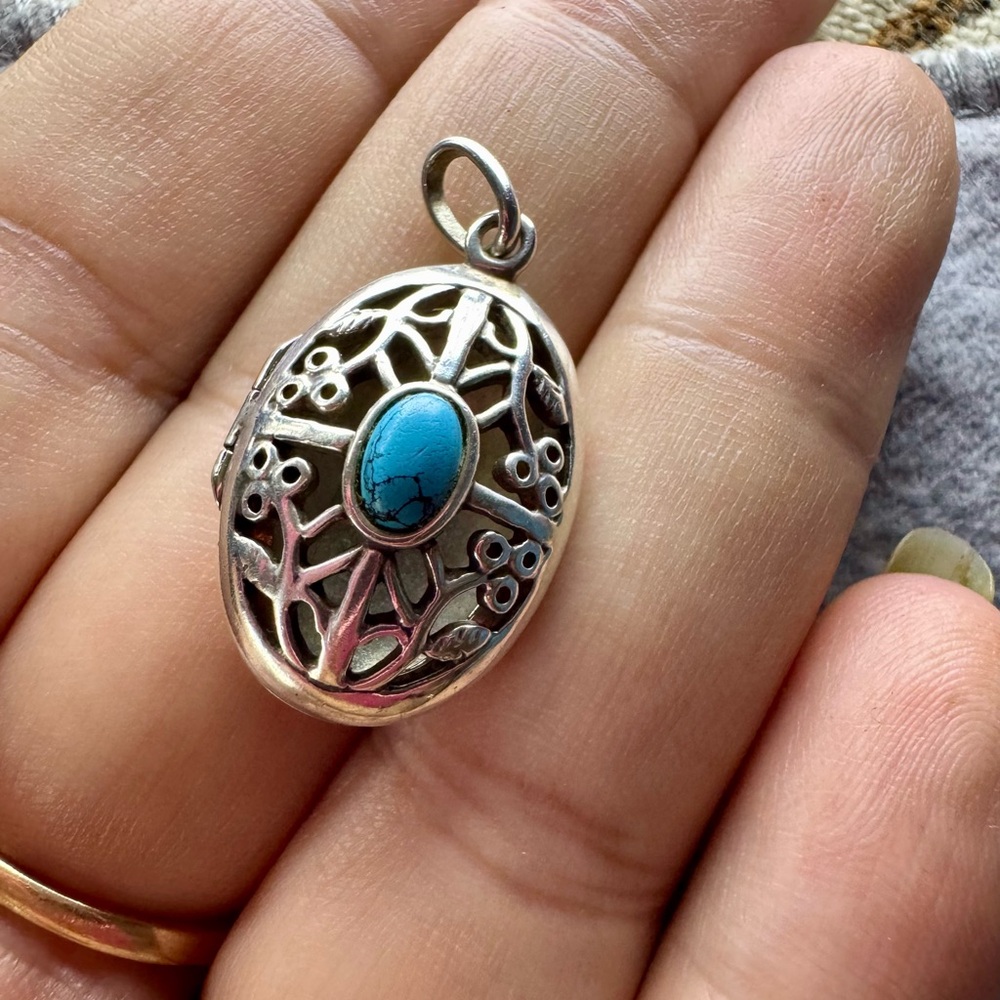 Intricate Silver Locket with Turquoise Accent